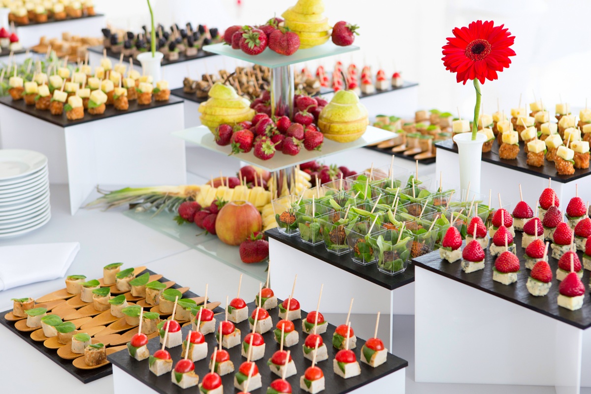 pics - 2 Buffet-style dessert station with assorted mini desserts.